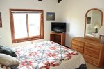 Mammoth Vacation Rental Sunrise 51 -  Bedroom with a Queen Bed and Flat Screen TV